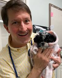 This is Macie. She was both my tiniest patient and tiniest kiss of the day.  Macie believes in always staying cozy and blanket-wrapped, even when  visiting the doctor. I may just try