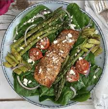 Brush salmon with mustard and evenly arrange asparagus and onions on fish. Salmon Roasted Asparagus Salad Heather Mangieri Nutrition
