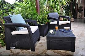 This set of furniture includes two chairs. Keter 17194274 Corfu 2 Seater Balcony Garden Outdoor Rattan Furniture Set Graphite With Cream Cushions Wholesale Scout