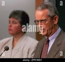 Massachusetts Institute of Technology President Charles M. Vest, right,  speaks with reporters concerning the laughing gas death of MIT junior  Richard Guy in Cambridge, Mass., Friday, Sept. 3, 1999. Susan Mosher, an