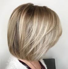 Angel wings with highlighted curls. 50 Mesmerizing Medium Length Layered Haircuts For 2020 Julie Il Salon