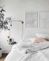 Prediction These 6 All White Bedroom Ideas Will Make Minimalists Swoon Hunker All White Bedroom Minimalist Bedroom Design Simple Bedroom