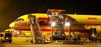 A plane waits to be loaded with the night's cargo. 65 Dhl Ideas Cargo Airlines Cargo Aircraft Cargo Carriers
