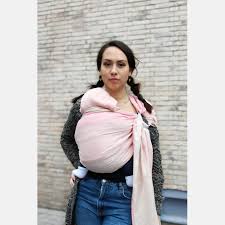 To use the sling, wrap around your shoulder and slip the other end of the sling through the middle of both rings and then over the first and under the second. Yaro Newborn Rose Ring Sling