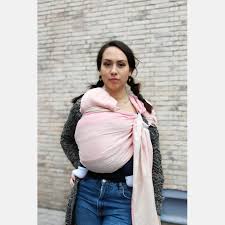 A newborn naturally takes a great position when you hold them to your chest. Yaro Newborn Rose Ring Sling