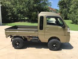 2018 daihatsu hijet jumbo cab 4 lift 25 tires made by toyota samurai mini in 2020 mini trucks daihatsu mini trucks 4x4
