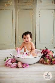 Bath time with basin and ribber duck. Baby Milk Bath Photography Singapore 100 Days Or Sitters