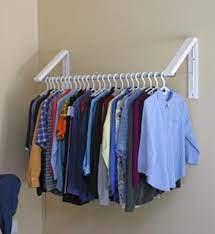 A wall mounted clothes rail is a practical and stylish option for both retail stores and in the home. Wall Mounted Hanging Rack Ideas On Foter