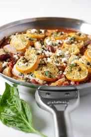 Mediterranean Baked Fish With Artichokes And Olives Recipe Baked Fish White Fish Recipes Everyday Food