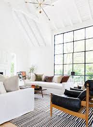 Exposed ceiling beams add visual interest, textural detail, and a framing quality that makes other elements pop. Should Wood Beams Be Painted Or Left Natural Dans Le Lakehouse
