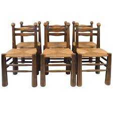 Set Of Six Straw Seat And Oak Dining Chairs In The Style Of Jean Royere Oak Dining Chairs Chair Dining Chairs