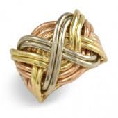 Jose grant has been making puzzle rings since 1947. Gold Puzzle Rings