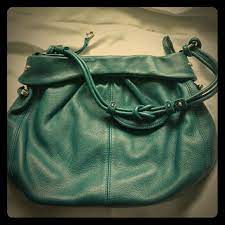 He was the first pick for the edmonton oilers in the 1990 nhl entry draft (17th overall), but never made the nhl. Allison Scott Bags Allison Scott Blue Green Hue Handbag Poshmark