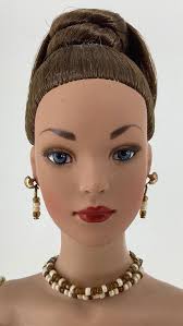 Sold at Auction: Robert Tonner Tyler Wentworth 16" Tyler doll wearing  "Champagne Bubble" champagne-colored silk bubble dress, the bodice is  lavishly hand-beaded with gold beads and pearls, gold satin evening sandals  trimmed