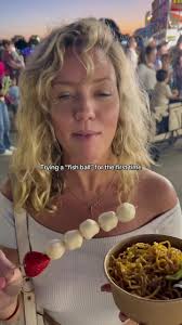 Trying a Fish Ball at the Dream Asia Festival