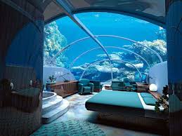 1.6 aquarium built into the bedroom wall. Awesome Except Do People Scuba In That I Don T Want Someone To Look In On Me On The Hot Tub Ther Underwater Hotel Underwater Bedroom Underwater Hotel Room