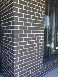 Triangle brick company's chesapeake grey brick features beautiful shades of smoky gray, brown and dark charcoal. 10 Dark Brick With Light Mortar Ideas Brick Exterior House Brick House Exterior