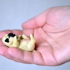 Do you know what's cuter than one cute little puppy? Needle Felted Little Sleeping Pug Puppy From Fenekdolls On Etsy