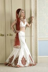 White Lengha Lighter Design With Red Veil Indian Wedding Outfits Indian Bridal Wear Indian Wedding Dress
