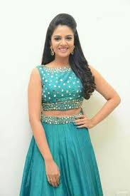 Image Of Puff And Loose Curly Locks For Lehenga Choli Lehenga Hairstyles Crop Top Designs Blouse Designs