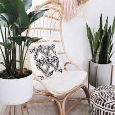 gorgeous seating area with items from world market white planters with planter stands rattan cocoon c rattan chair leather dining room chairs swinging chair