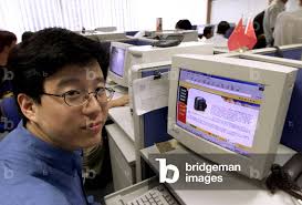 Image of William Ding, 28, CEO of Chinese Internet company Netease, inspects