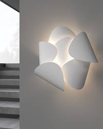 Funky multi coloured wall clocks. Lotus Wall Light Features A Radial Arrangement Of Whisper Like Petals Like The Arching Streams Of A Fountain Catch The Light Fr Wall Lights Lamp Design Light