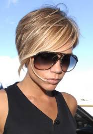 Victoria beckham sporting her fashionable short angled bob haircut with layers, also called a pob. See These Amazing Victoria Beckham Hair Human Hair Color Hair Colors Ideas For Short Hair Bob Cut Hair Coloring Hair Colors Ideas