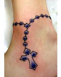 The cross tattoo has been a popular fixture in the ink world since tattoos were invented. 18 Blessed Cross Rosary Ankle Tattoos