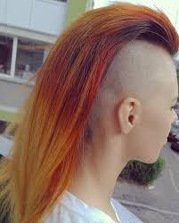 This guy flaunts a very tidy mohawk haircut that has clean shaved sides and a slim patch of long sleek mohawk hairstyle. 10 Offbeat Mohawk Hairstyles With Shaved Sides For Women Wetellyouhow