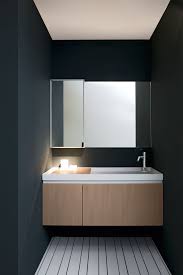 A vaulted ceiling is painted a cool gray, complemented by chrome fixtures and a modern pendant. Pin On Work 2012 05