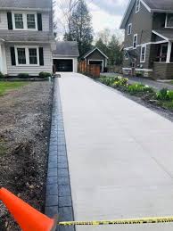 View 18 best concrete driveway edging images. Cobble Stone Border Concrete Driveway Distinctive Concrete Facebook