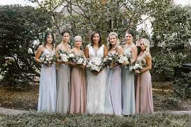 Colorful wedding dresses come in a wide range of different hues from soft blushes to pastel blues to deep emeralds. Multi Colored Dresses Are A Great Way To Create A Unique Look For Your Brida Wedding Photography Bridal Party Bridesmaid Dress Color Schemes Multicolor Wedding