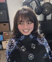 textured bangs and shorter layers hairstyle