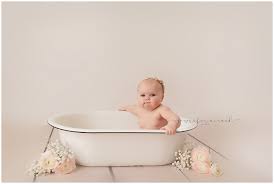 Especially for a shorter trip, you can often bathe the baby with just a sink and some washcloths. Baby Milk Bath Photo Session Mirockphoto