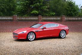 Image result for Magma Red 2011 Aston Martin