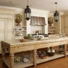 When designing a kitchen, consider the island as another counter or work surface and decide how it will be a part of (or not a part of) the kitchen work triangle. 22 Contrasting Kitchen Island Ideas For A Stand Out Space Country Kitchen Designs Farmhouse Kitchen Design Rustic Farmhouse Kitchen