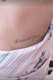 Sometimes you come across an image that is so rich and complex that it takes several viewings before you feel you've truly begun to take it all in. Brooklyn Beckham S Fiancee Nicola Peltz Gets A Tattoo Of His Name Entertainment Tonight