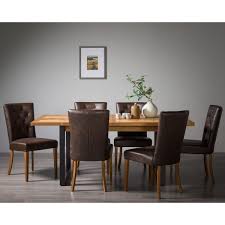 Top of table has a few marks from hot. Bentley Designs Herringbone Rustic Oak Extending Dining Table 6 Chairs Seats 6 8 Costco Uk