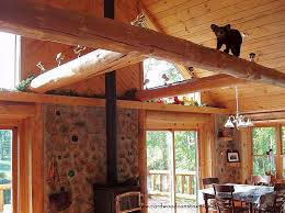 This cabin has an open dining/kitchen/living room downstairs, with one bedroom and a full sized bathroom. Cordwood On A Basement Is Off Grid Cordwood Construction