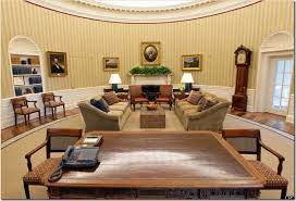 The legs' bases are finished in cherry with a silver finish on the top. Cote De Texas The Oval Office Before After