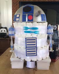 7 Edgy Cool Diaper Cakes That Make Us Change Our Minds About Them Star Wars Baby Shower Baby Shower Diaper Cake Baby Shower Diapers