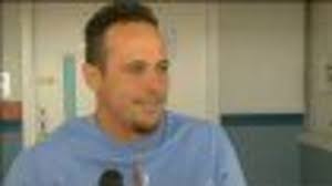 Shark bites North Shore surfer, warning signs posted