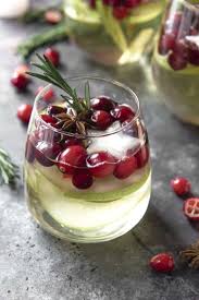You Ll Be Dreaming About This White Christmas Sangria Long After The Holidays Have Come To An End Christmas Sangria Recipes Christmas Drinks Christmas Sangria