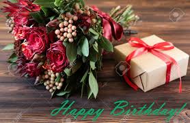 Send the birthday gift to the usa: Beautiful Fresh Flower Arrangement Of Red Roses Gift Box And Text Wish Birthday Greeting Card Concept Stock Photo Picture And Royalty Free Image Image 113915691