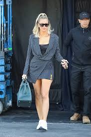 A discovery and shopping platform for the latest celebrity looks. Khloe Kardashian S Stripe Mini Dress Show Off Toned Legs Pics Hollywood Life