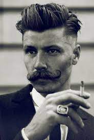 Handlebar Mustache He Is So Doing This Moustache Style Mens Hairstyles Hair And Beard Styles