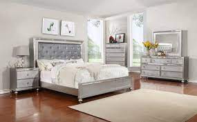 We start with the platform bed, which features footboard drawers for storage in a subtle design. B4183 Contemporary Bedroom Set In Silver Finish
