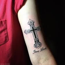 Forearm small cross tattoo designs. Amazing Grey Ink Jesus Love Cross Tattoo On Forearm