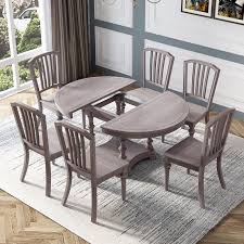 This grey dining table and chairs set is brought to the forefront in a darker shade of grey than the lighter grey kitchen behind. Modern Grey Color Solid Wood Extendable Round Dining Table With 6 Chairs Living Room Sets Aliexpress